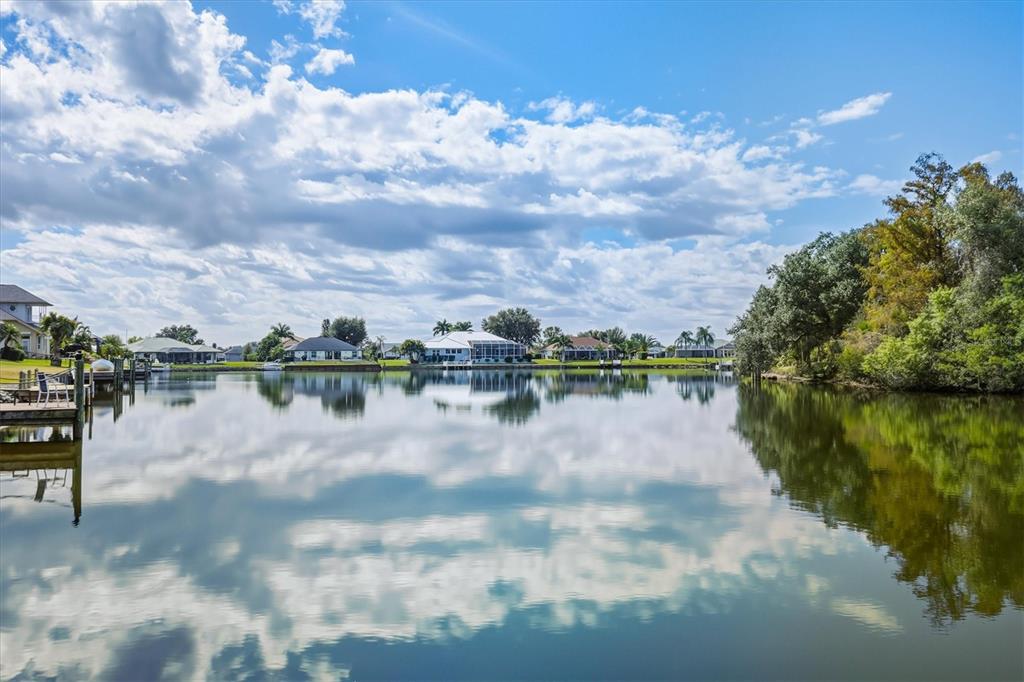 12577 Southwest Kings Row Lake Suzy, FL 34269 - Photo 46 of 56 a view of a lake