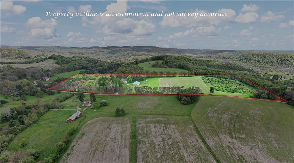 596 Wulfert Road Rochester Mills, PA 15771 - Photo 2 of 49 a view of a lake with a big yard