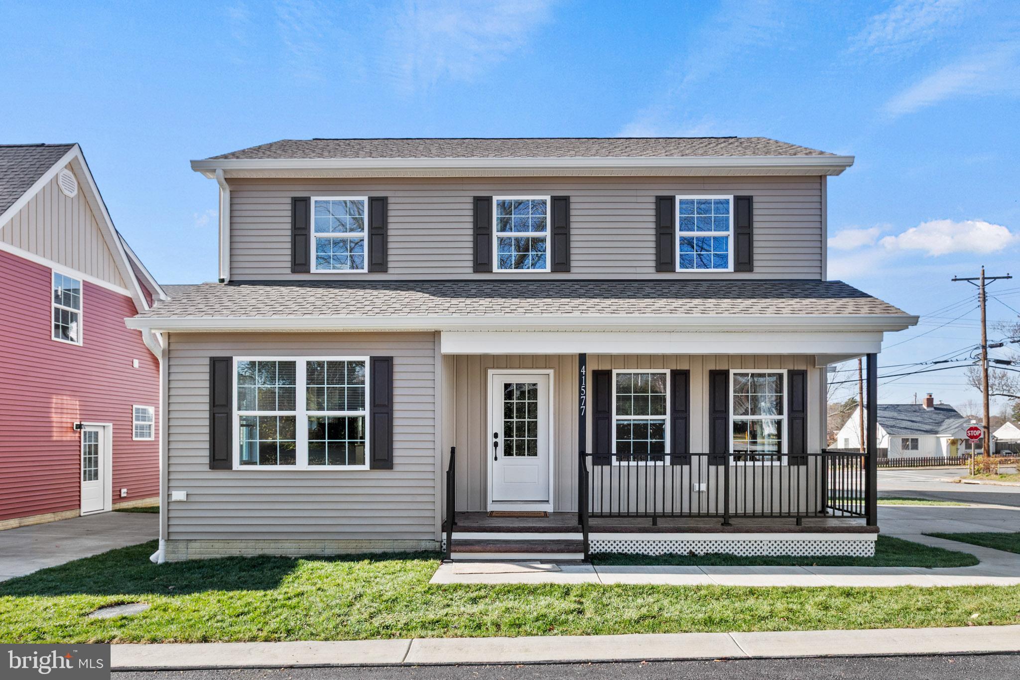 41577 Church Street Leonardtown, MD 20650 - Photo 2 of 25 a front view of a house with a yard