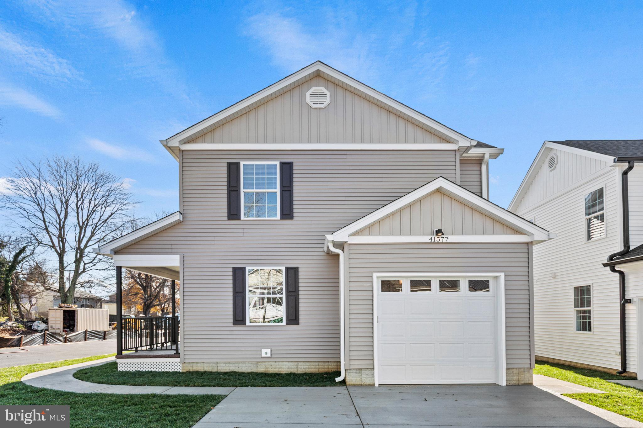 41577 Church Street Leonardtown, MD 20650 - Photo 3 of 25 a front view of a house with a yard