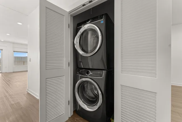 a view of a storage & utility room with a washer dryer