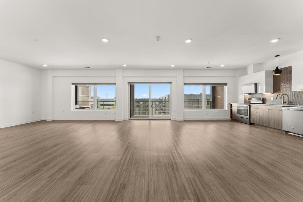 4361 South Congress Avenue, Unit 514 Austin, TX 78745 - Photo 2 of 28 a view of a livingroom with furniture wooden floor and windows