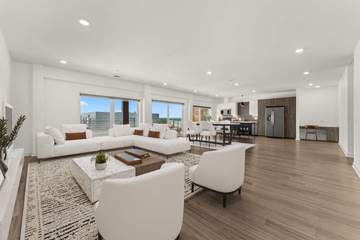 4361 South Congress Avenue, Unit 514 Austin, TX 78745 - Photo 5 of 28 a living room with furniture and a wooden floor