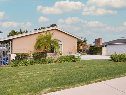 a view of a backyard of the house