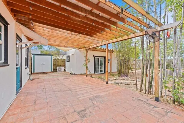 a view of a backyard of the house