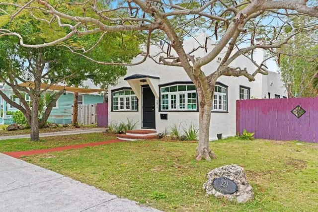 front view of a house with a big yard