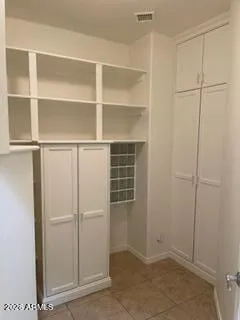 a view of an empty walk in closet