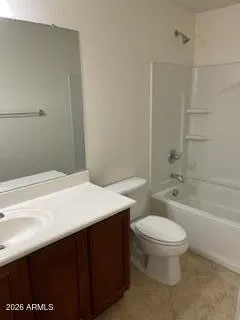 a bathroom with a sink a toilet and bathtub