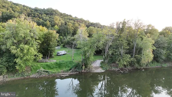 a view of a lake with a house