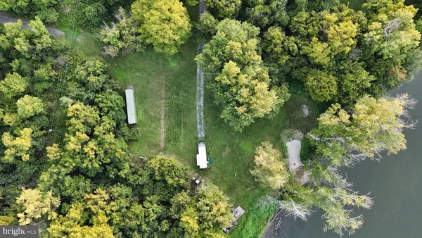 a view of a lake with a house