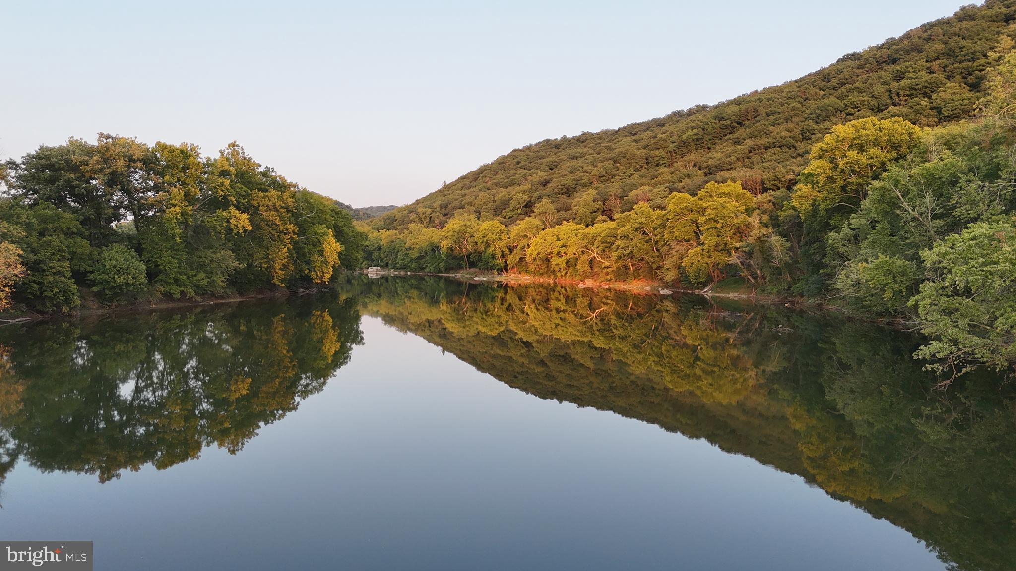 Lot 8-10 Howellsville Road Boyce, VA 22620 - Photo 34 of 42 a view of a lake with a mountain in the background