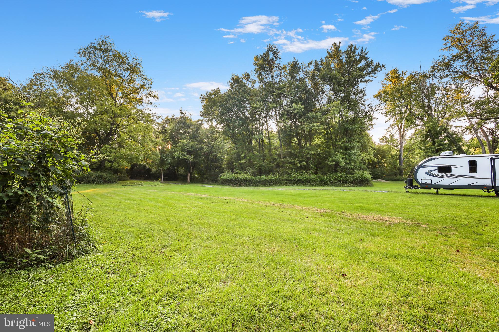 Lot 8-10 Howellsville Road Boyce, VA 22620 - Photo 42 of 42 a view of a yard with a house in the background