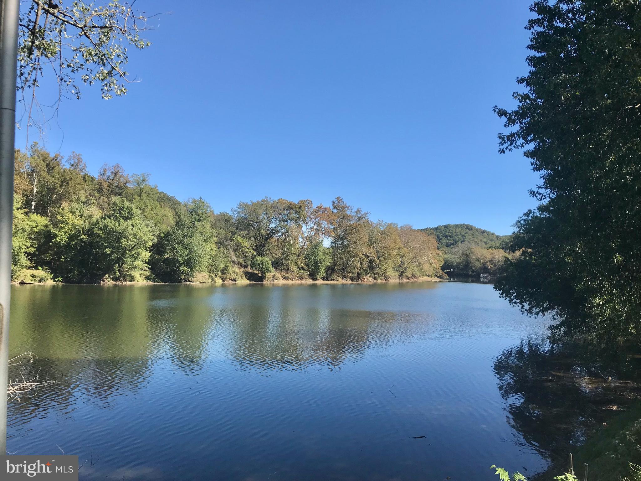 Lot 8-10 Howellsville Road Boyce, VA 22620 - Photo 6 of 42 a view of a lake with a mountain