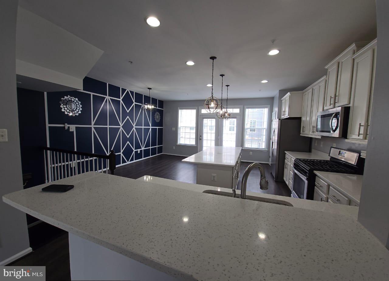 211 Spring Bank Avenue Frederick, MD 21701 - Photo 3 of 24 a view of a room with gym equipment
