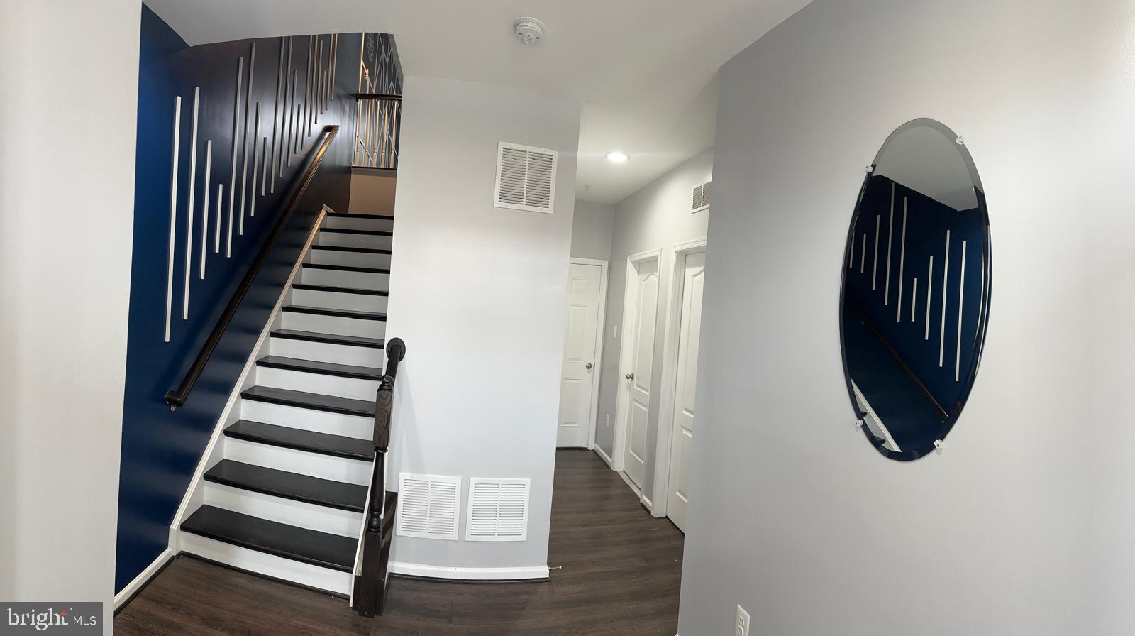 211 Spring Bank Avenue Frederick, MD 21701 - Photo 9 of 24 an entryway in a hall with wooden floor