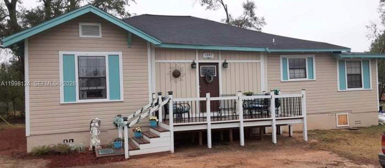 1005 Lakewood Road Pensacola, FL 32507 - Photo 13 of 23 a front view of a house with patio