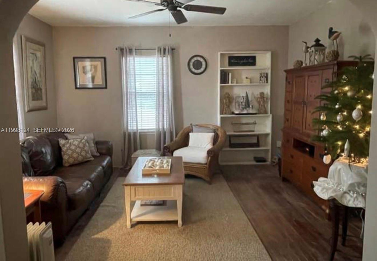 1005 Lakewood Road Pensacola, FL 32507 - Photo 17 of 23 a living room with furniture and wooden floor