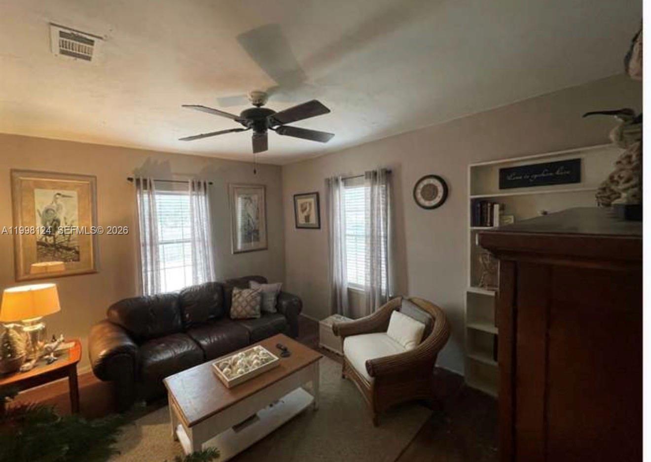 1005 Lakewood Road Pensacola, FL 32507 - Photo 18 of 23 a living room with furniture and a window