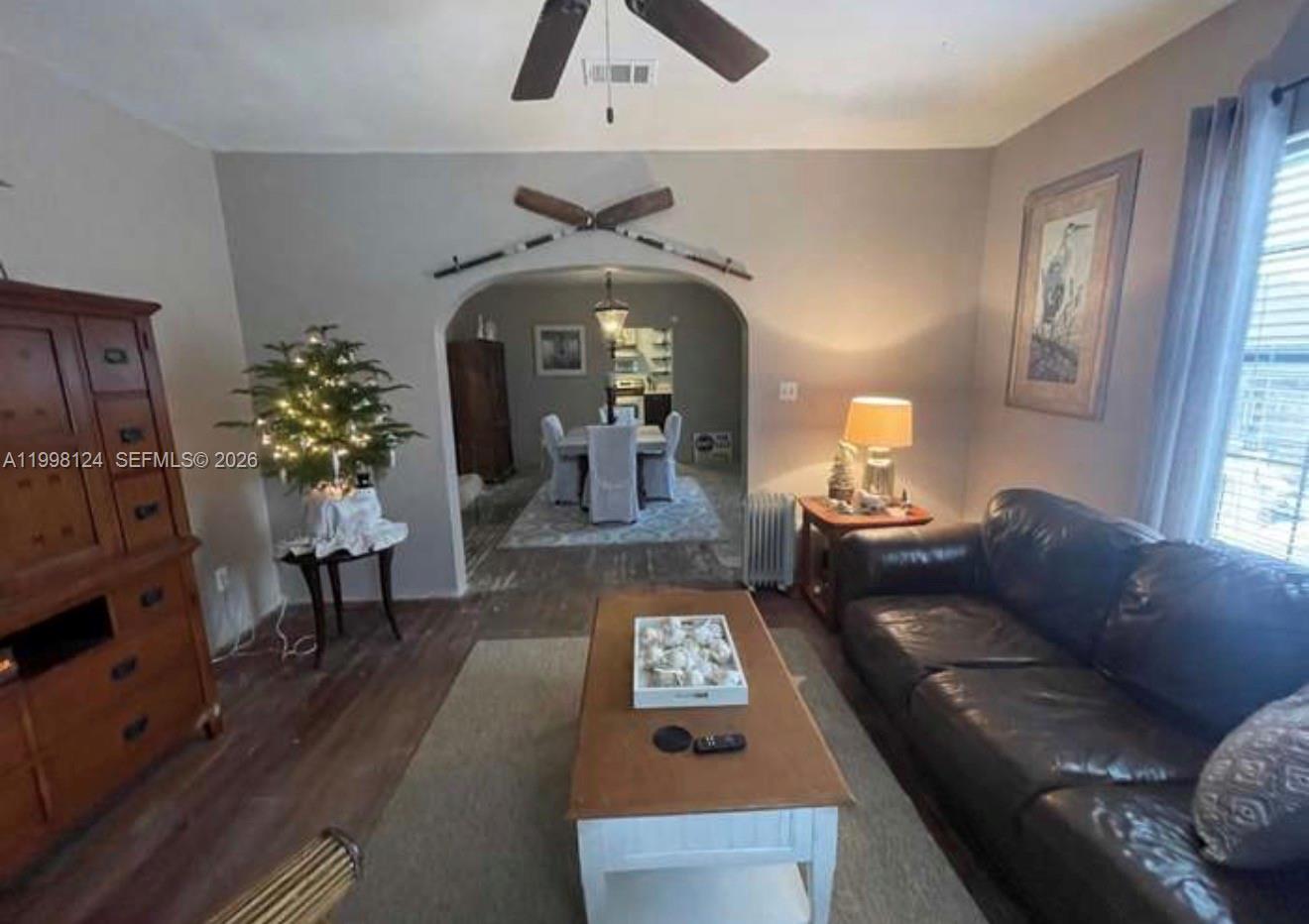 1005 Lakewood Road Pensacola, FL 32507 - Photo 19 of 23 a living room with furniture and a fireplace