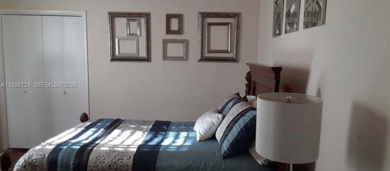 1005 Lakewood Road Pensacola, FL 32507 - Photo 6 of 23 a view of bedroom with furniture and closet