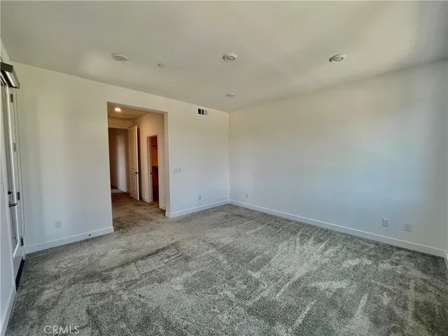 a view of a room with an empty space