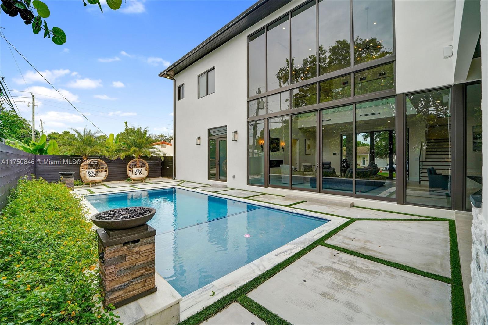 4321 Southwest 11th Street Miami, FL 33134 - Photo 6 of 43 Pool with fire features