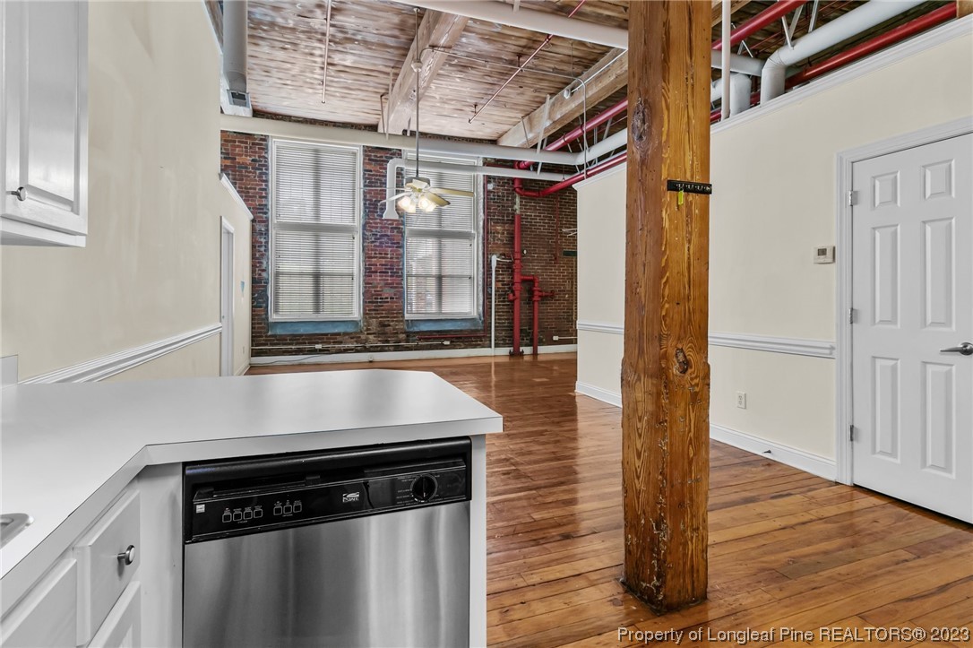 100 Carolyns Mill Place Rockingham, NC 28379 - Photo 11 of 30 a kitchen with stainless steel appliances granite countertop a stove and a refrigerator