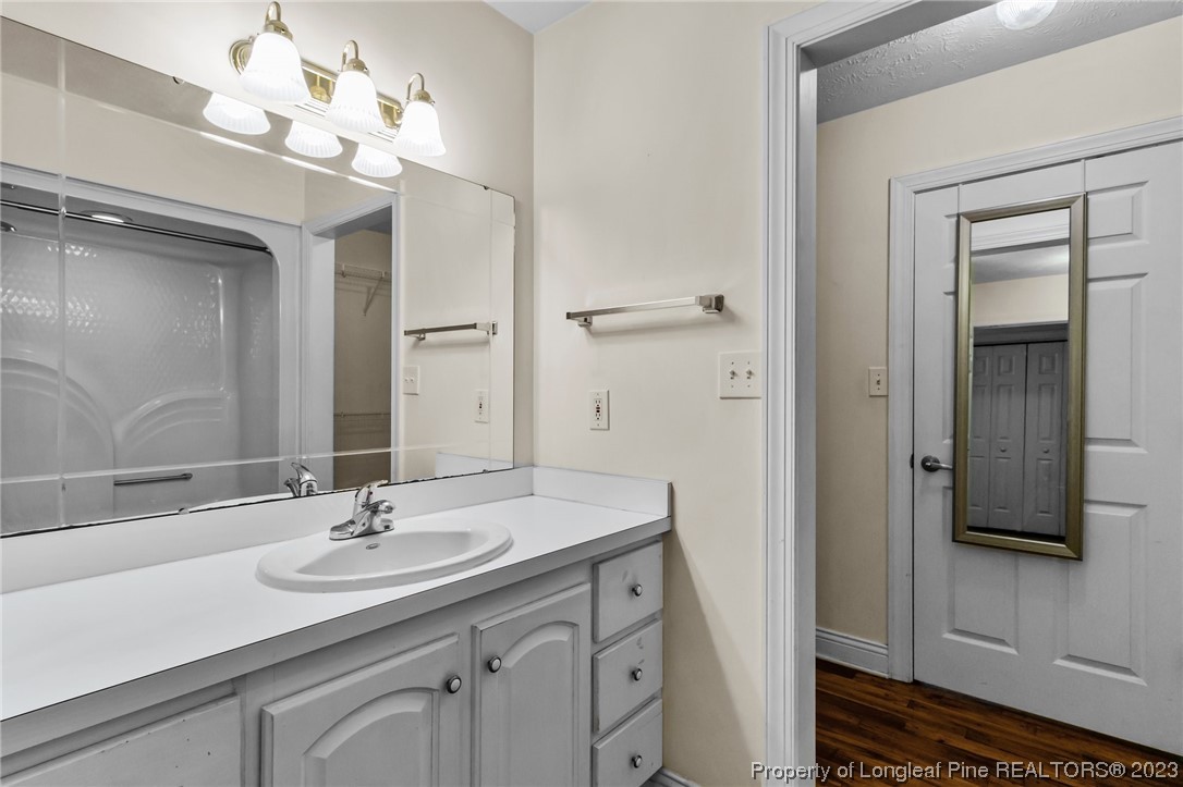 100 Carolyns Mill Place Rockingham, NC 28379 - Photo 12 of 30 a bathroom with a sink double vanity and a mirror