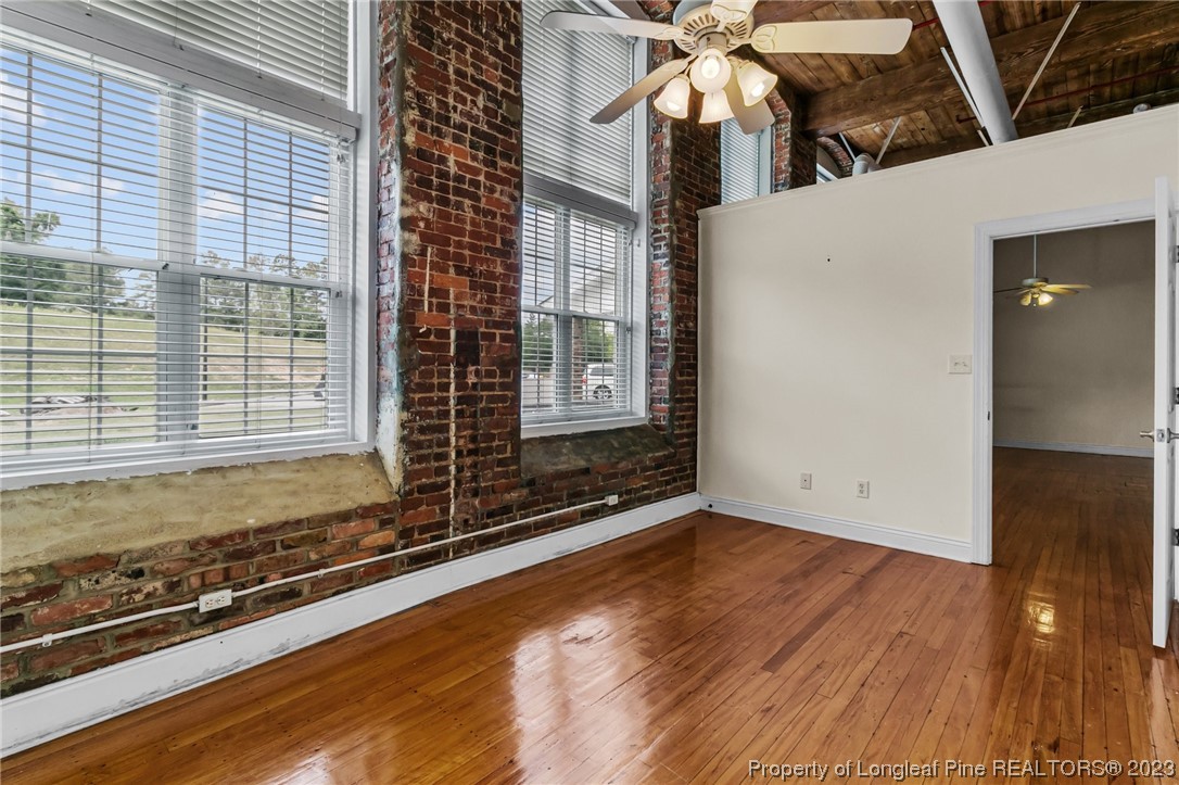 100 Carolyns Mill Place Rockingham, NC 28379 - Photo 21 of 30 a view of a room with wooden floor and windows