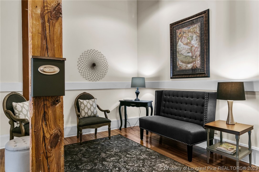 100 Carolyns Mill Place Rockingham, NC 28379 - Photo 28 of 30 a living room with furniture and a lamp