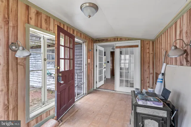 a view of livingroom with furniture wooden floor and windows