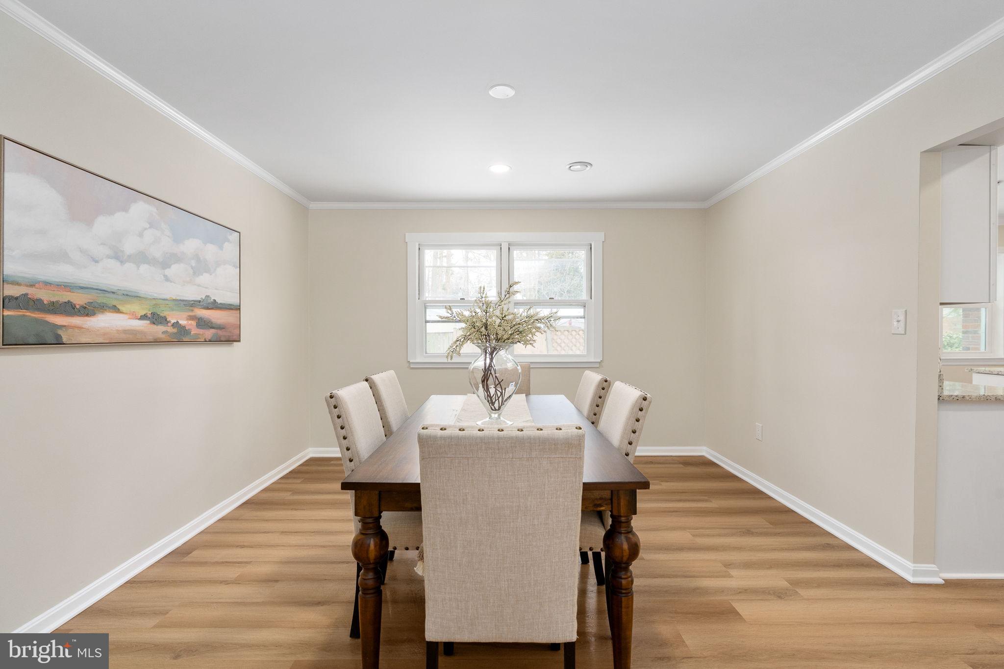3234 Riverview Drive Triangle, VA 22172 - Photo 16 of 61 a dining room with furniture and wooden floor