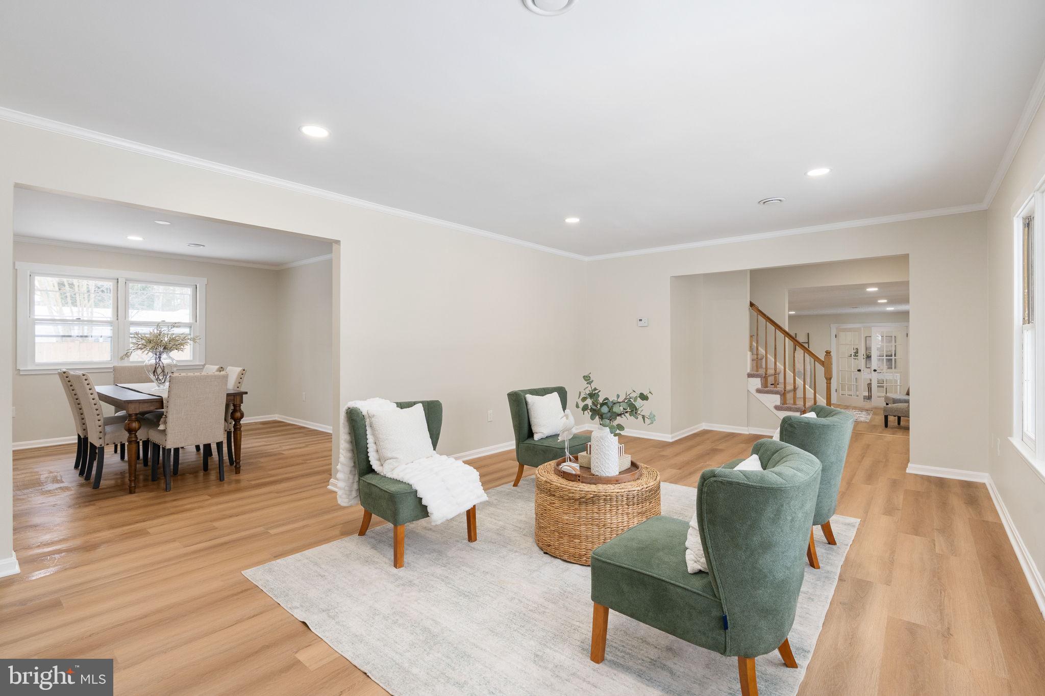 3234 Riverview Drive Triangle, VA 22172 - Photo 18 of 61 a living room with furniture a wooden floor and a rug