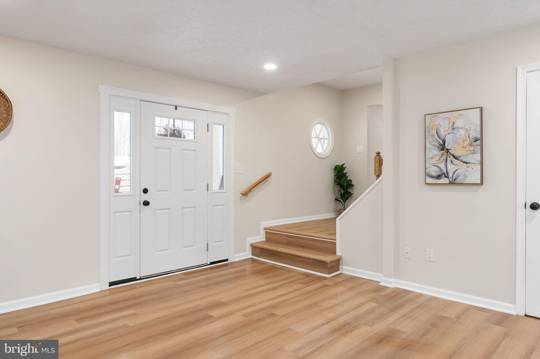 3234 Riverview Drive Triangle, VA 22172 - Photo 21 of 61 a view of entryway with wooden floor