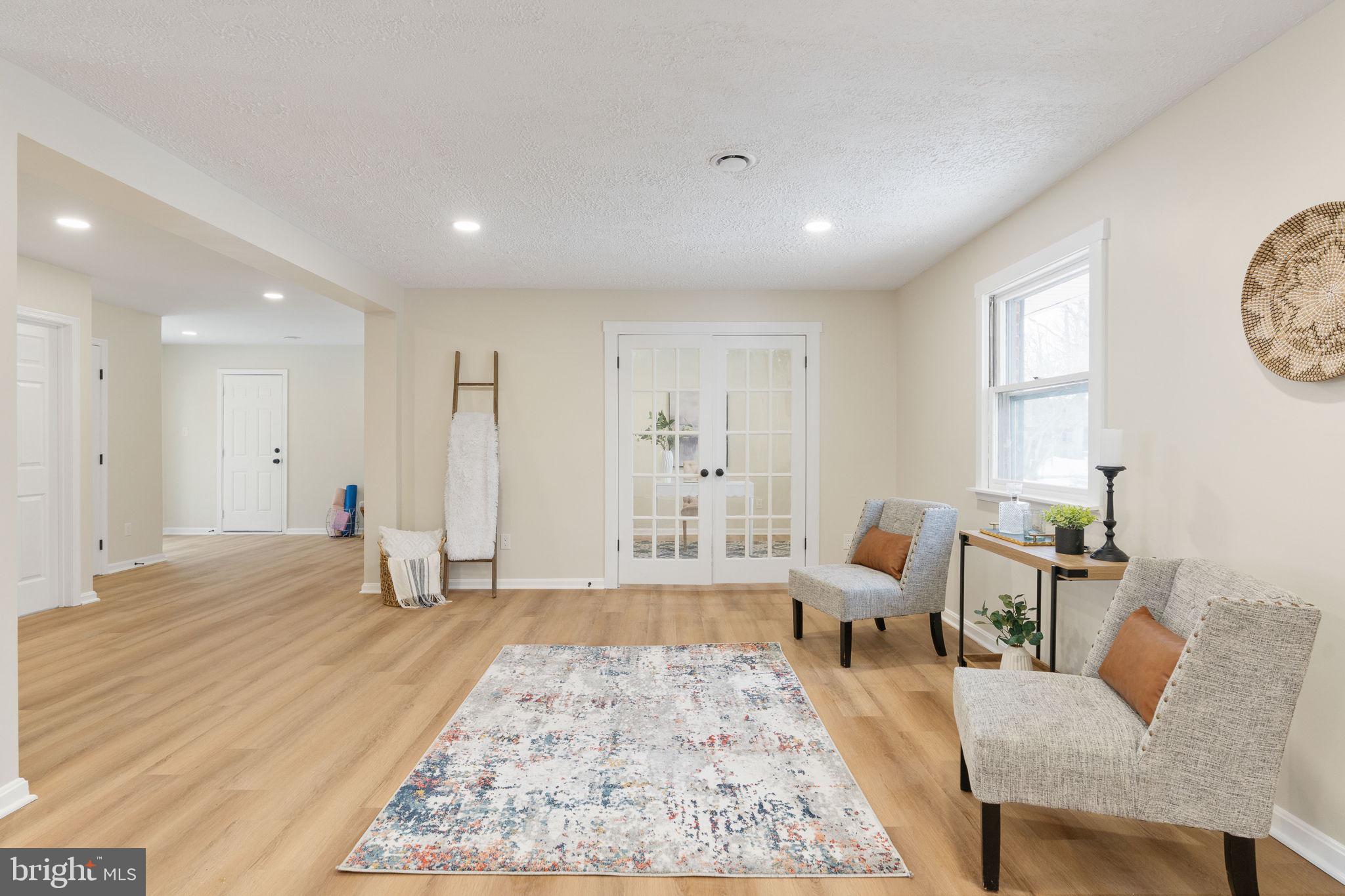 3234 Riverview Drive Triangle, VA 22172 - Photo 24 of 61 a living room with furniture and a rug