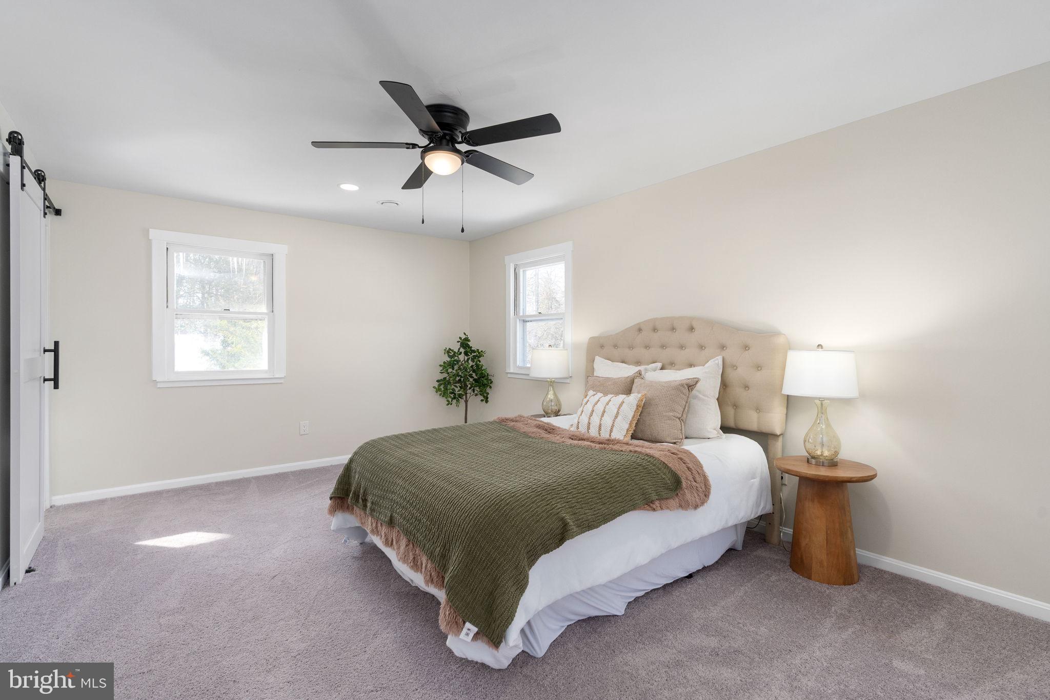 3234 Riverview Drive Triangle, VA 22172 - Photo 37 of 61 a bedroom with a bed and window