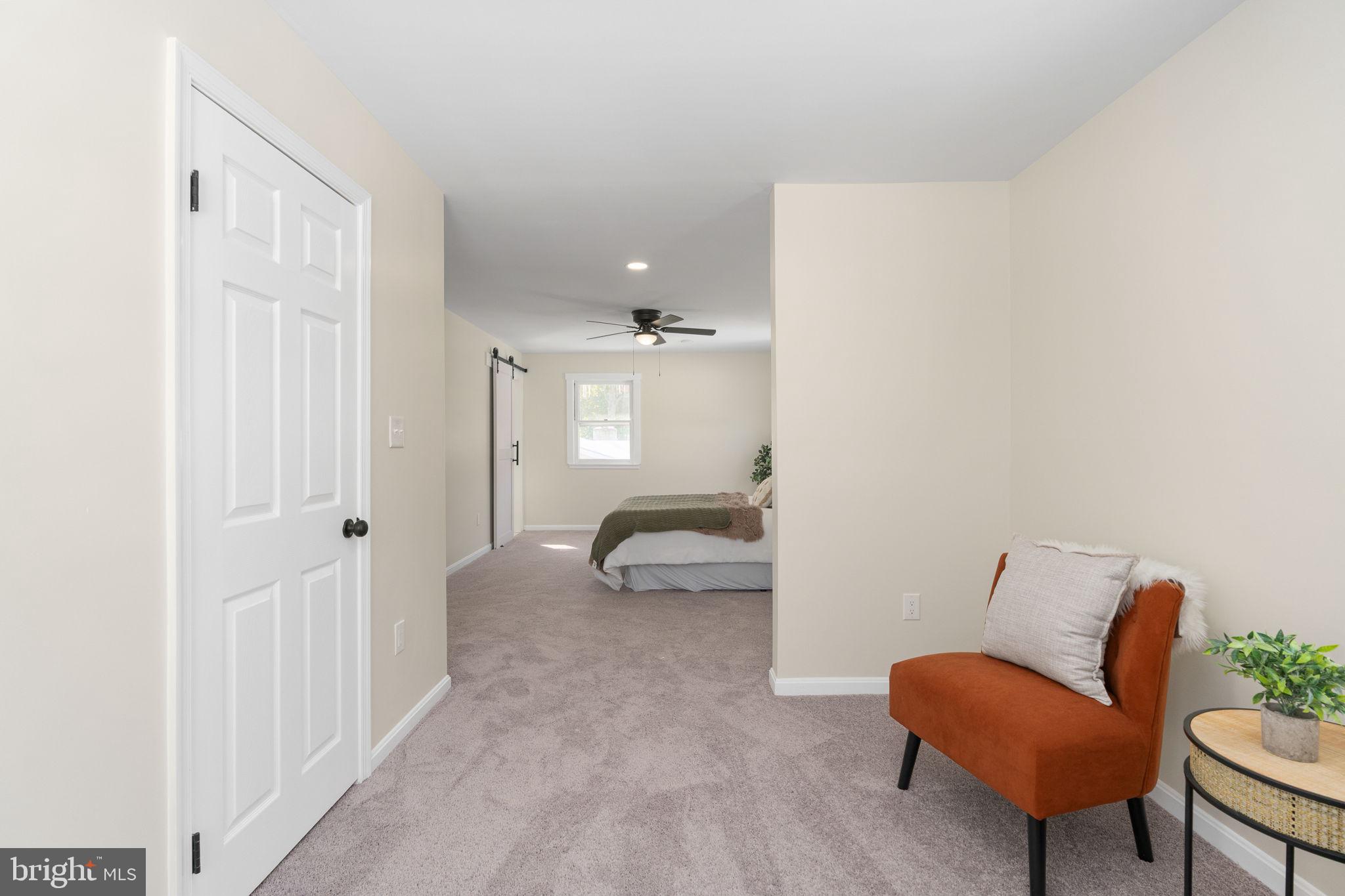 3234 Riverview Drive Triangle, VA 22172 - Photo 40 of 61 a bedroom with furniture and a chair