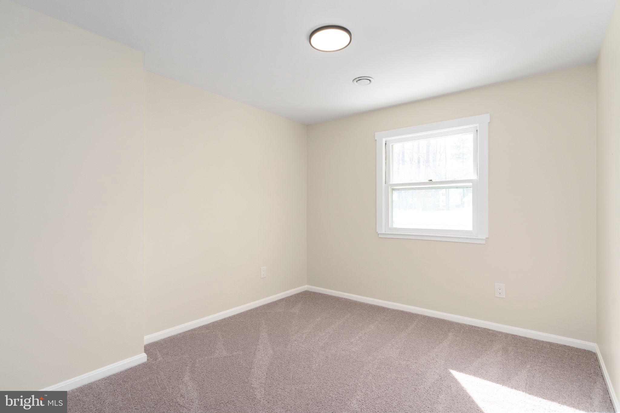 3234 Riverview Drive Triangle, VA 22172 - Photo 48 of 61 an empty room with a window