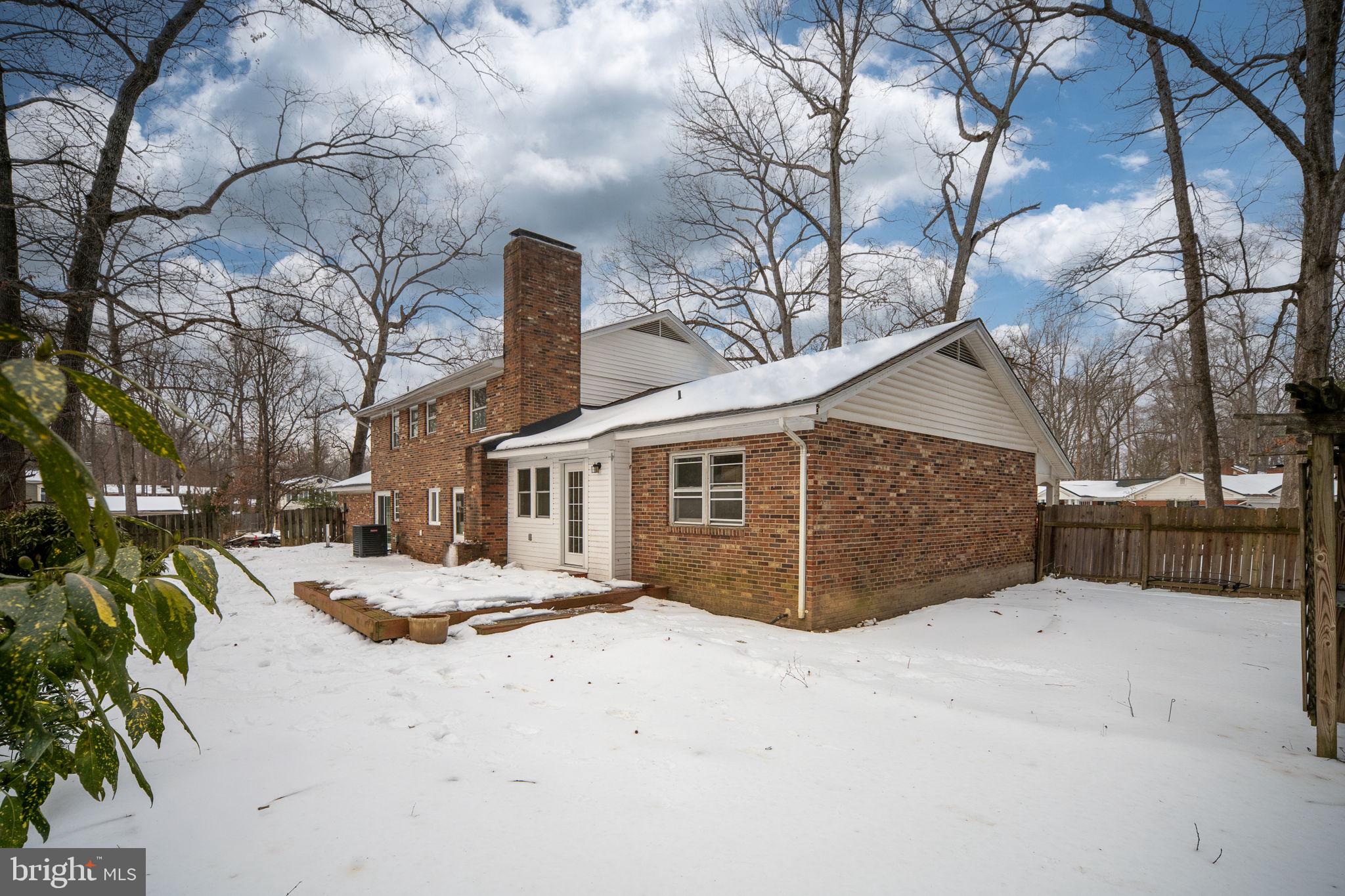3234 Riverview Drive Triangle, VA 22172 - Photo 57 of 61 a view of a house with a snow in the yard
