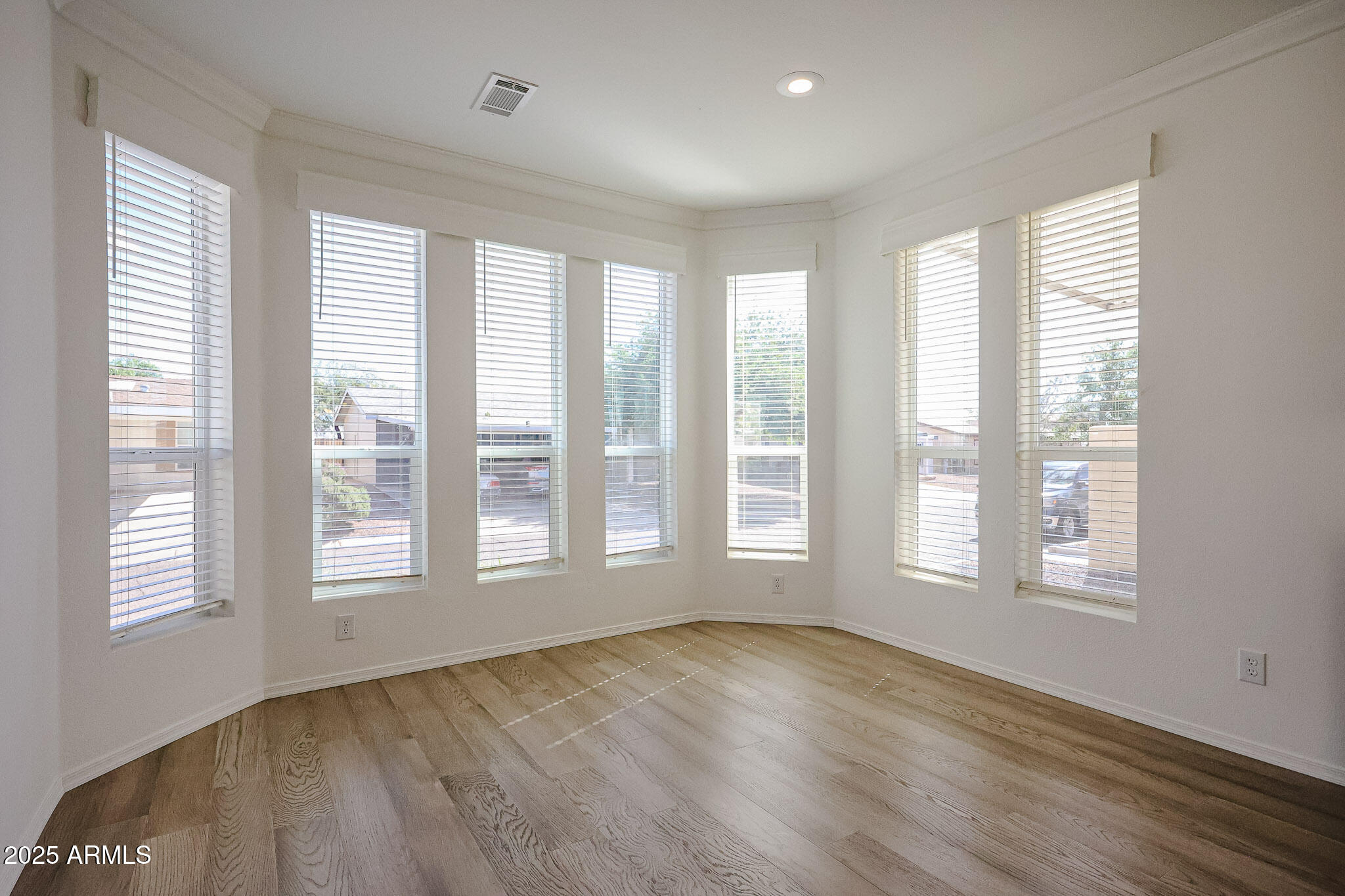 16101 North El Mirage Road, Unit 16 El Mirage, AZ 85335 - Photo 7 of 25 a view of an empty room with a window