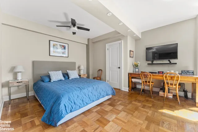 a kitchen with stainless steel appliances granite countertop a refrigerator and a stove