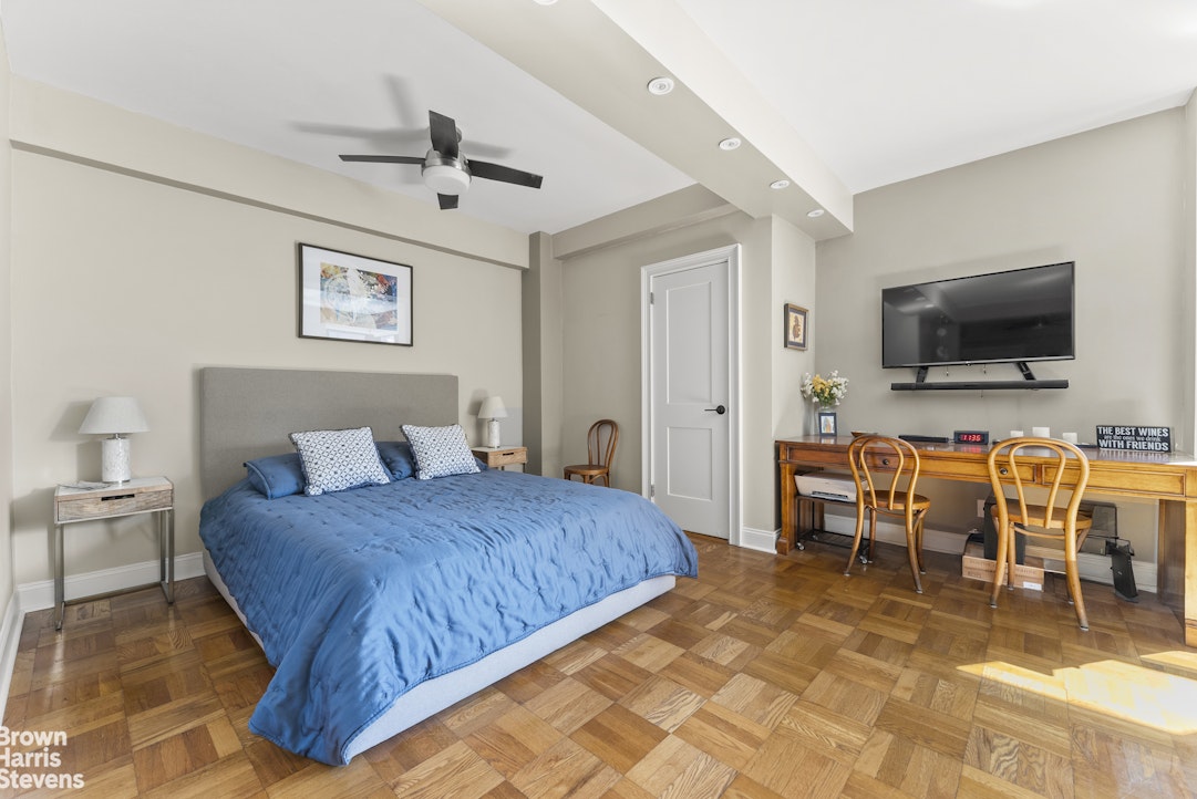 11 Riverside Drive, Unit 13GE Manhattan, NY 10023 - Photo 4 of 12 a bedroom with a bed and a view of living room