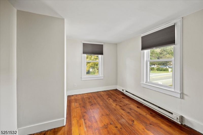 16 Schooleys Mountain Road, Unit 4 Long Valley, NJ 07853 - Photo 7 of 10 an empty room with window