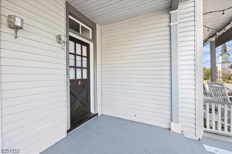 16 Schooleys Mountain Road, Unit 4 Long Valley, NJ 07853 - Photo 9 of 10 a view of a house with a white door