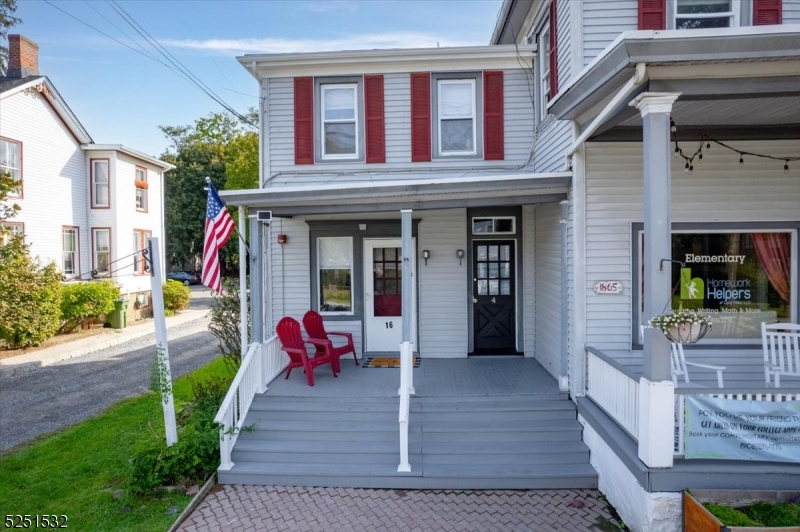 16 Schooleys Mountain Road, Unit 4 Long Valley, NJ 07853 - Photo 10 of 10 a view of front door of house with outdoor seating