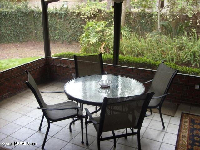 11468 Scott Mill Road Jacksonville, FL 32223 - Photo 20 of 25 a view of a chairs and table in patio