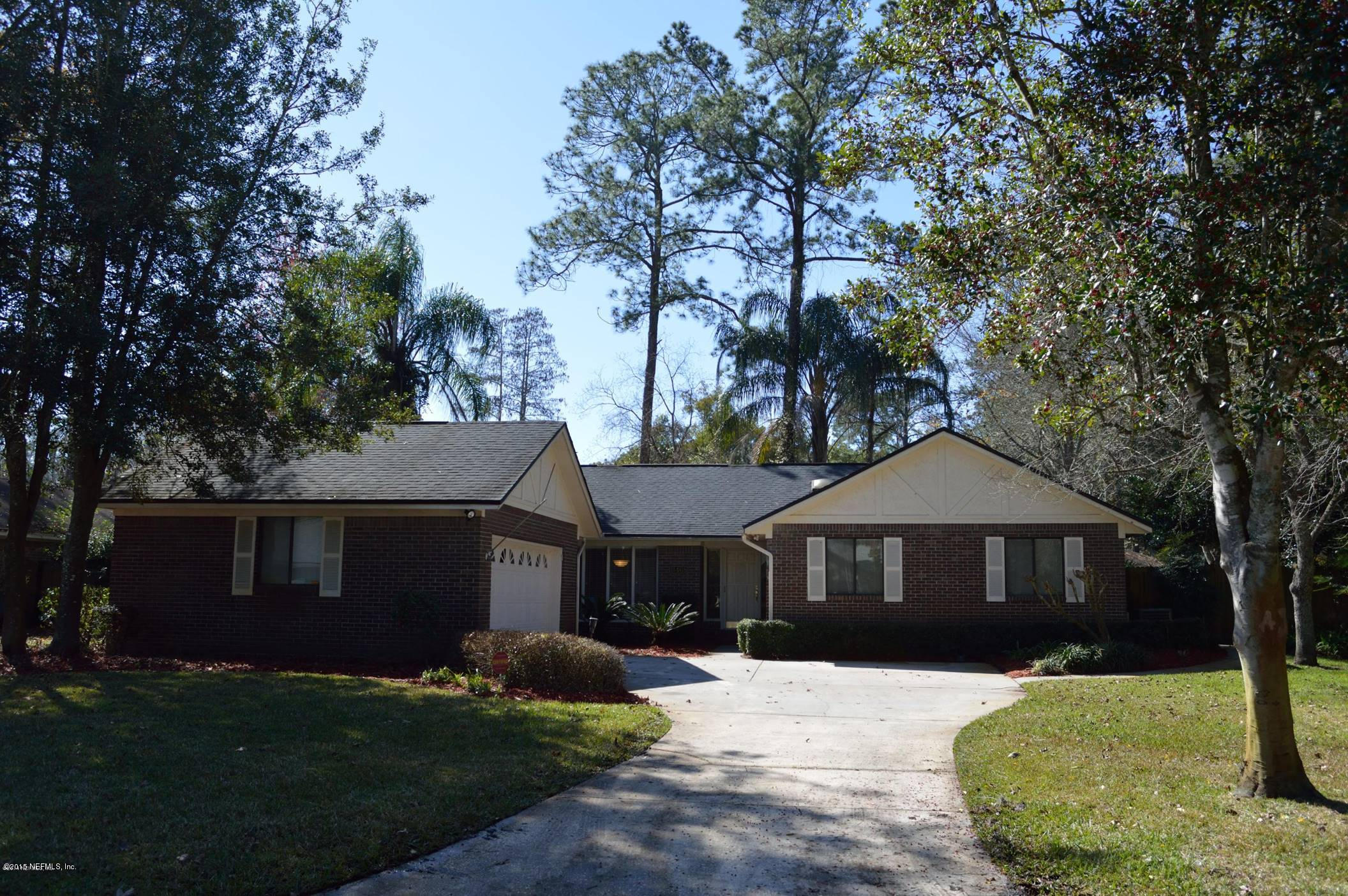 11468 Scott Mill Road Jacksonville, FL 32223 - Photo 2 of 25 a front view of a house with a yard