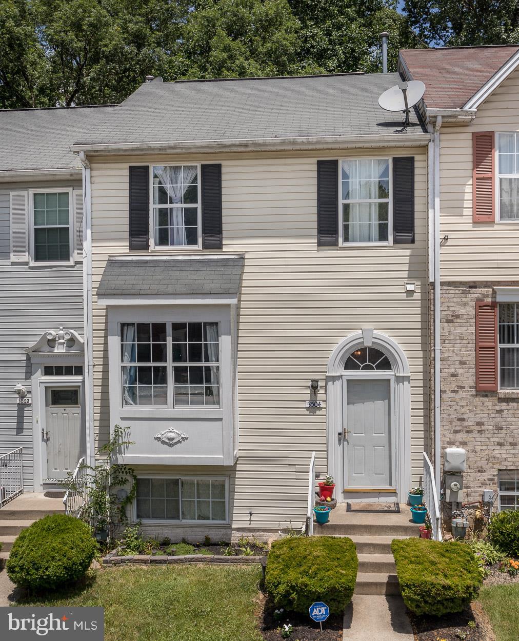 3504 Corn Stream Road Randallstown, MD 21133 - Photo 2 of 34 a front view of a house with a yard