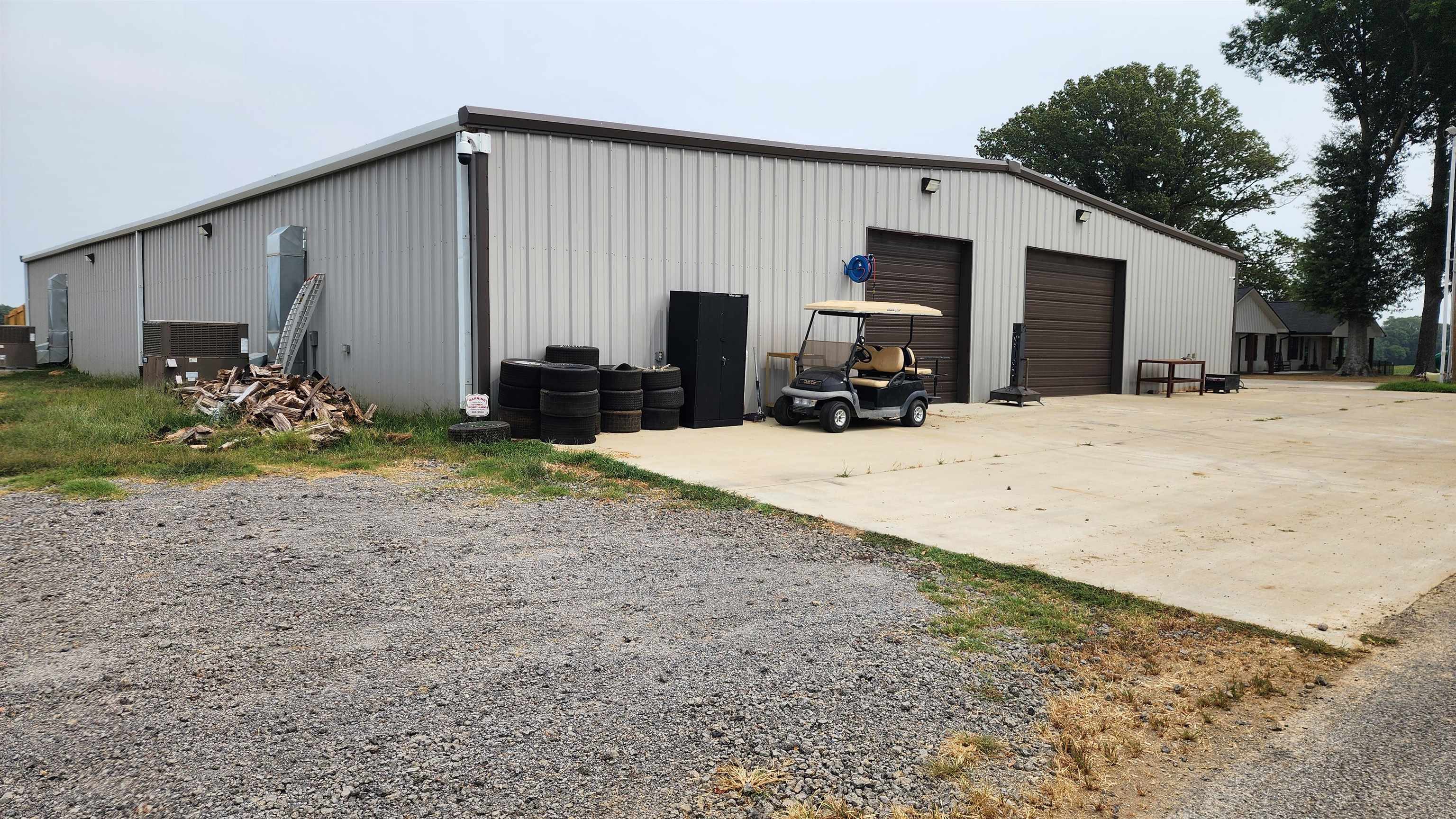 948 George Weakley Road Dyersburg, TN 38024 - Photo 19 of 31 a view of a house with backyard