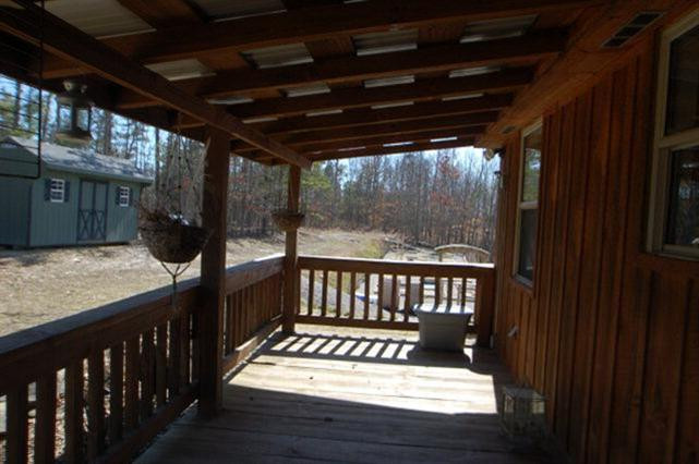 764 Brushy Ridge Road McKee, KY 40447 - Photo 10 of 25 The back porch runs the width of the hom